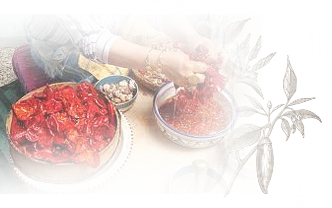 image d'une femme prepare la harissa le phare du cap bon